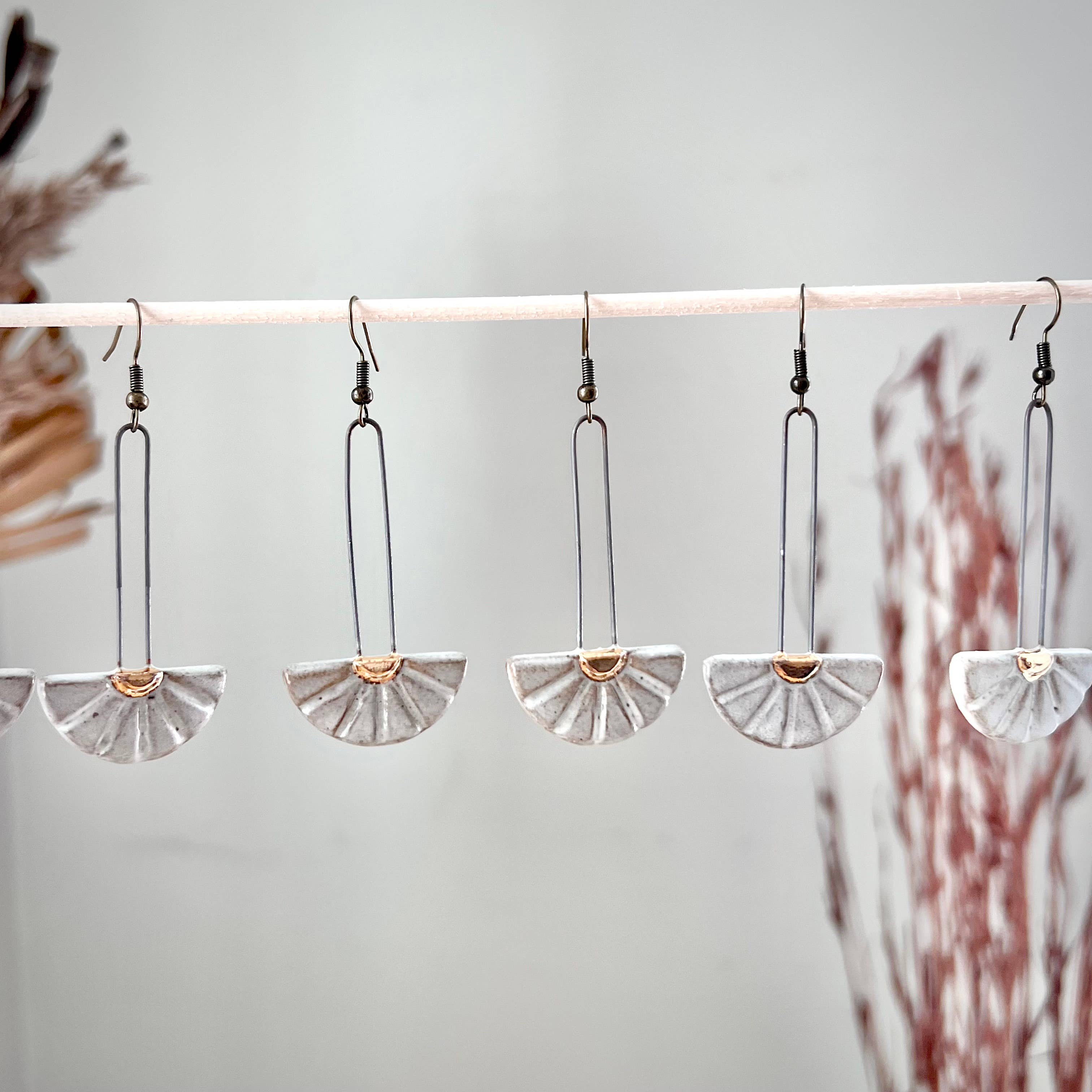 White Dropped Half Sun Burst Earrings