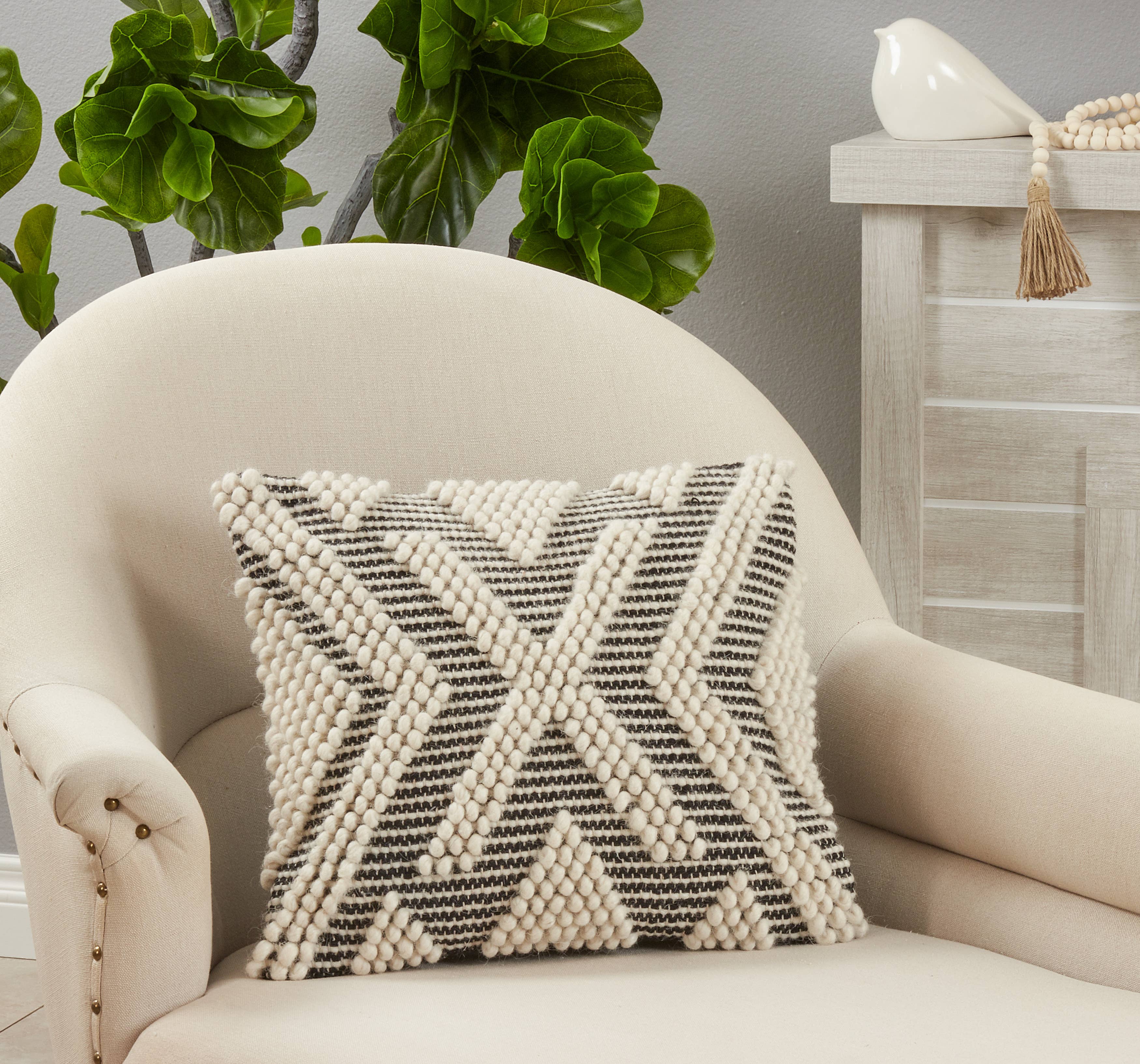 Throw Pillow With Arrow Woven Design