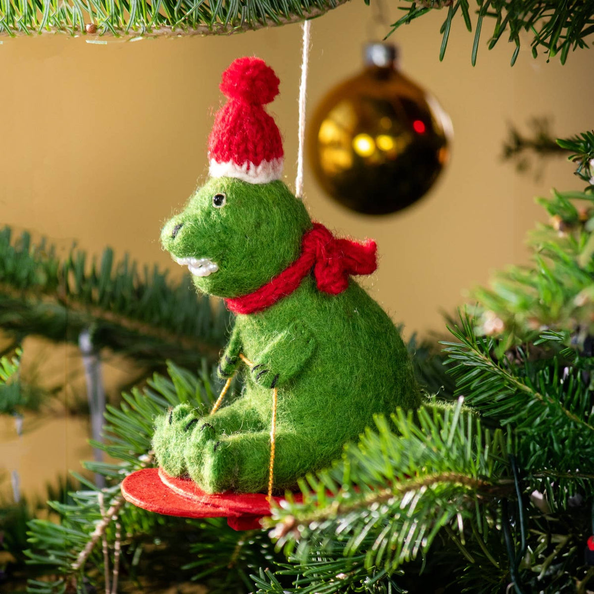Sledding T-Rex Ornament
