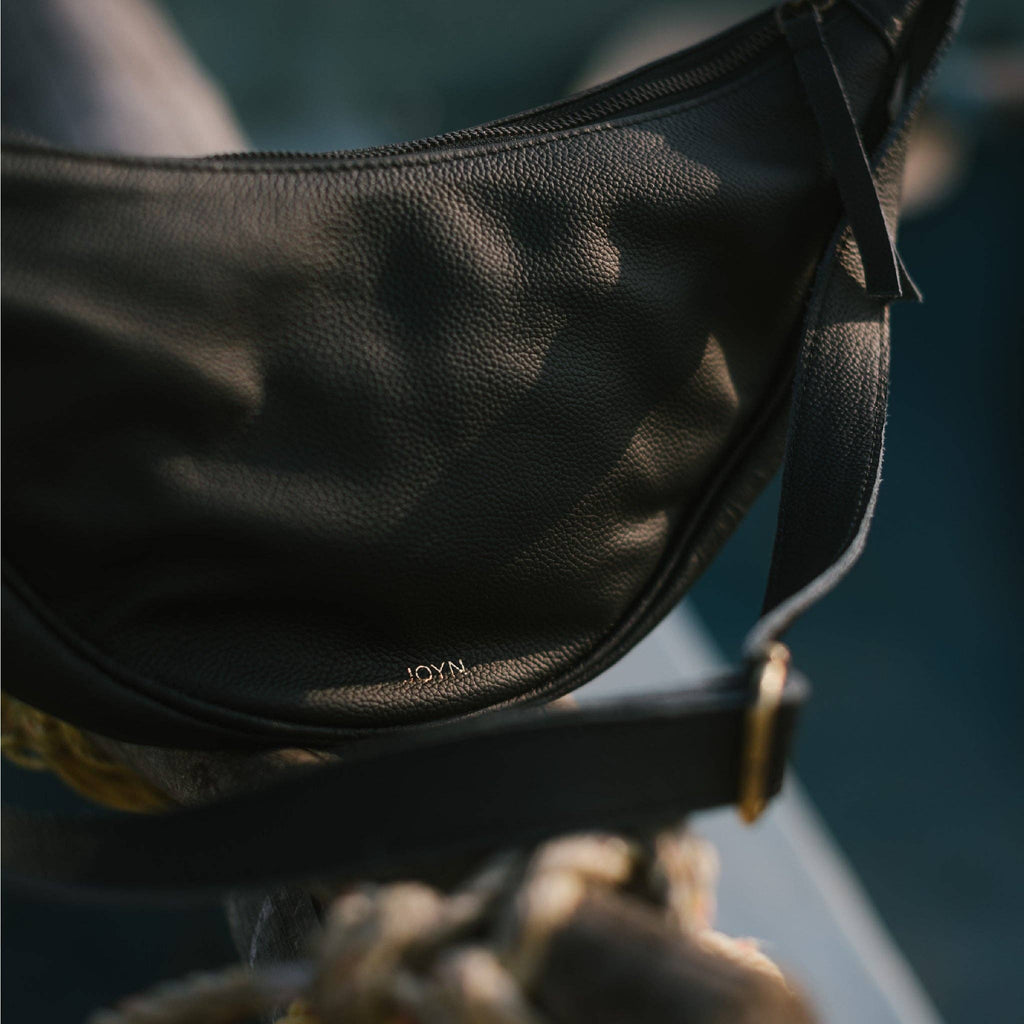 Pebbled Leather Moon Sling Bag - Black