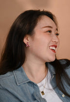 Poised Petal Earrings in Plum