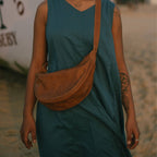 Pebbled Leather Moon Sling Bag - Camel