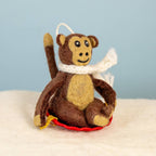 Sledding Monkey Ornament