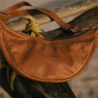 Pebbled Leather Moon Sling Bag - Camel