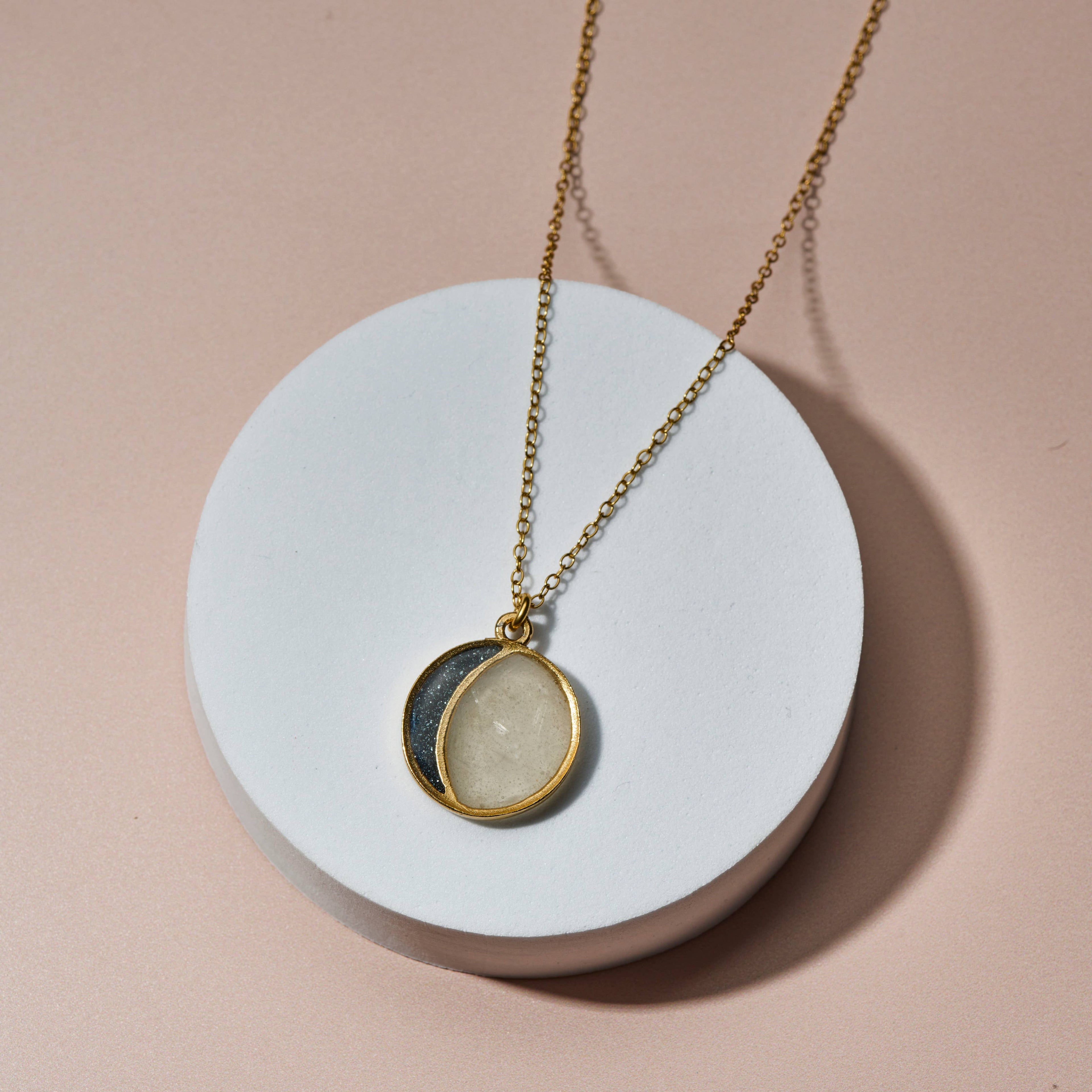 The New Moon Necklace with crushed gemstones